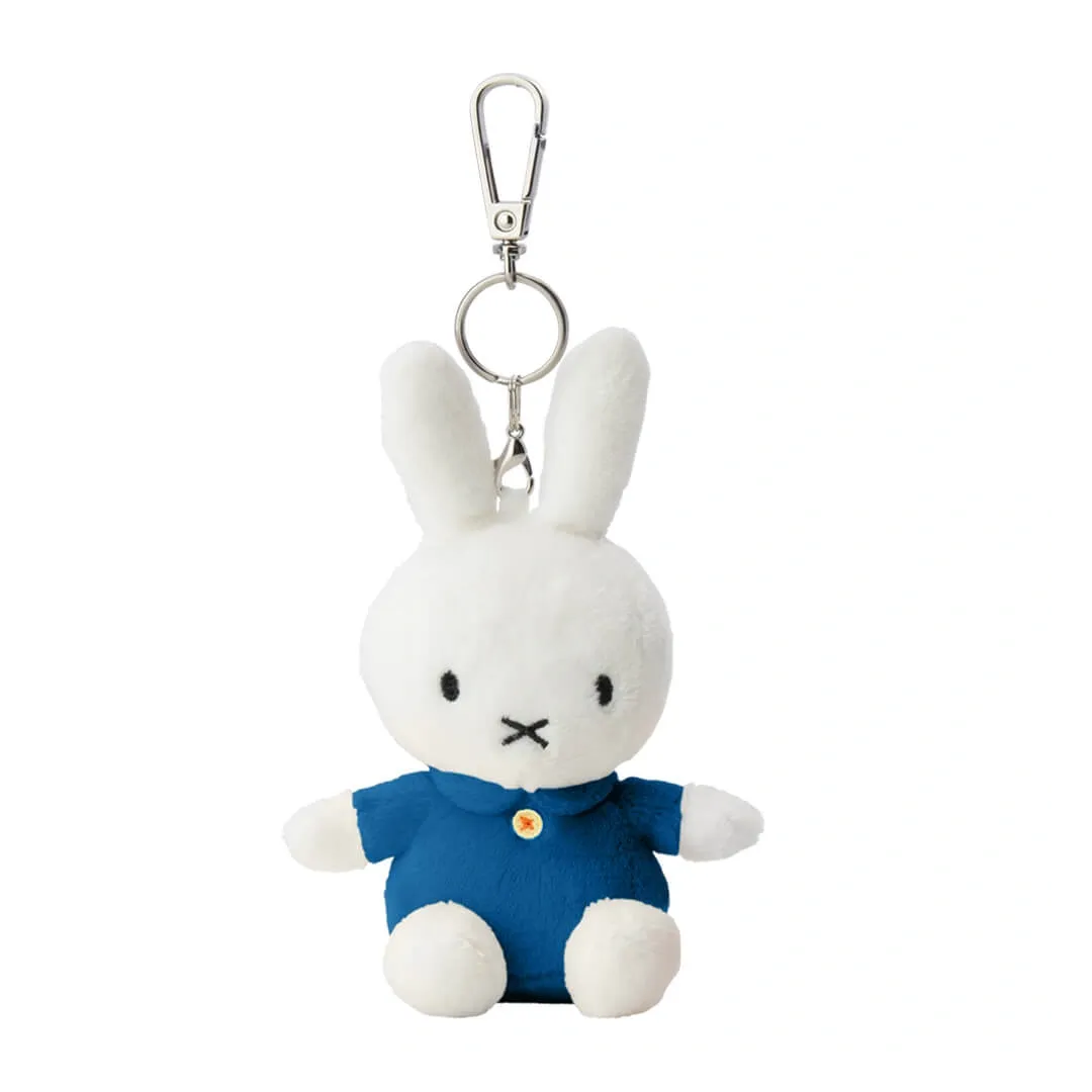 Plush rabbit keychain with a blue outfit on a white background