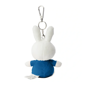 Plush keychain of a white rabbit character wearing a blue outfit on a white background