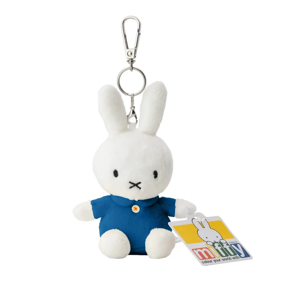 Plush Miffy rabbit keychain with a blue outfit on a white background