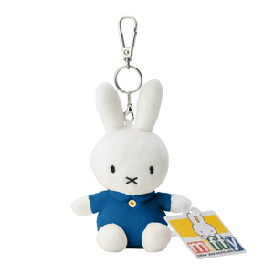 Plush Miffy rabbit keychain with a blue outfit on a white background