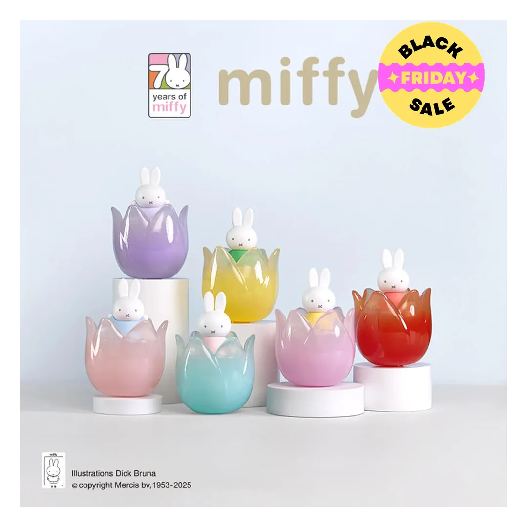 Set of colorful miffy figurines in egg-shaped holders on a light blue background with 'miffy' branding.