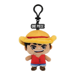 Plush keychain of a character from 'One Piece' with a yellow hat and red shirt on a white background.