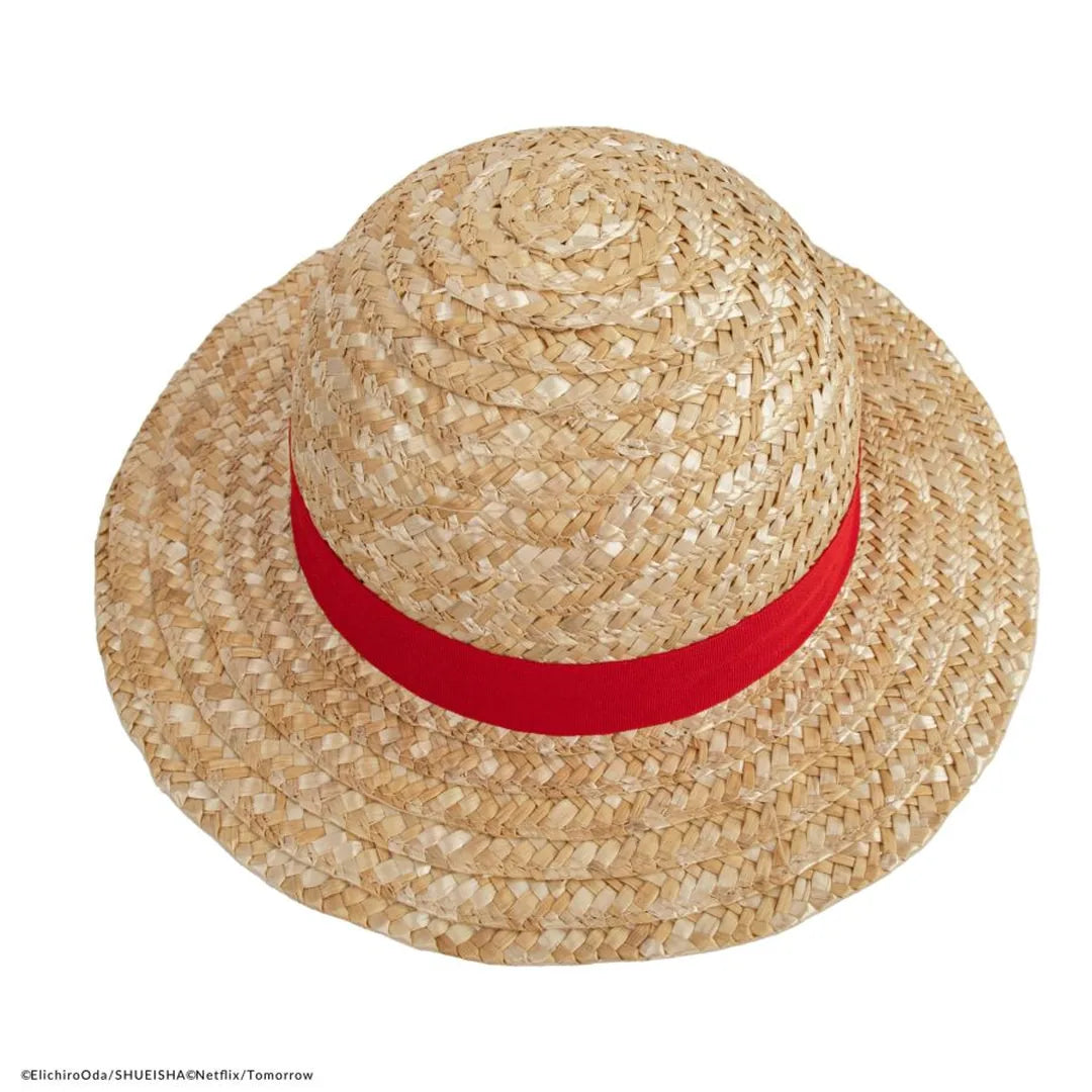 Straw hat with a red band on a white background. One piece cosplay hat 