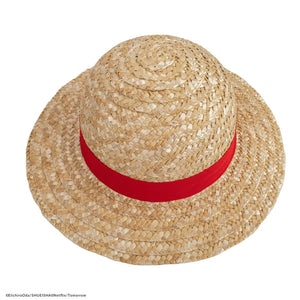 Straw hat with a red band on a white background. One piece cosplay hat 