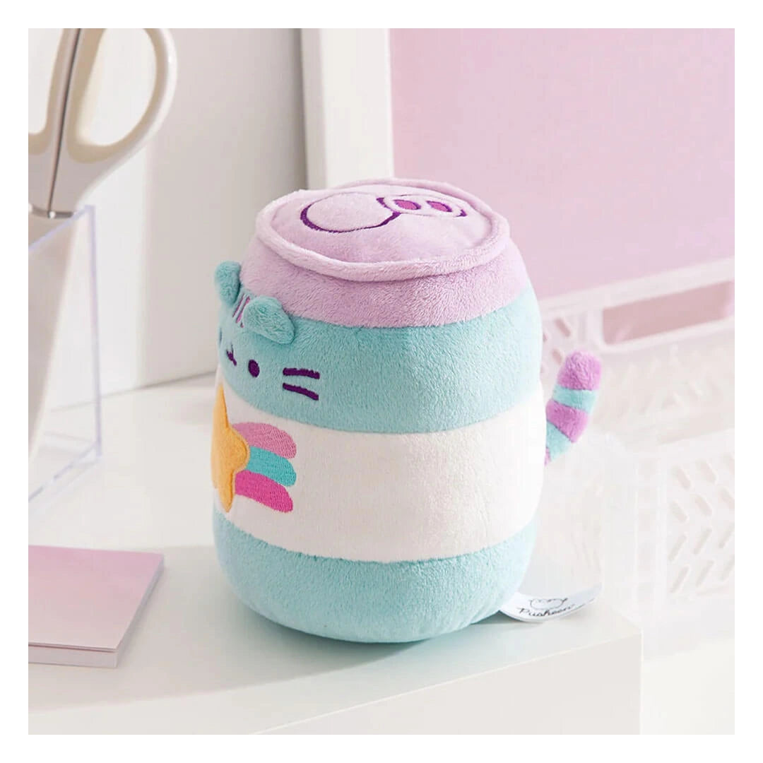 Pastel-colored plush toy with a cat design on a white surface.