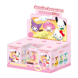Box of Sanrio character wobble machine display with colorful packaging on a white background
