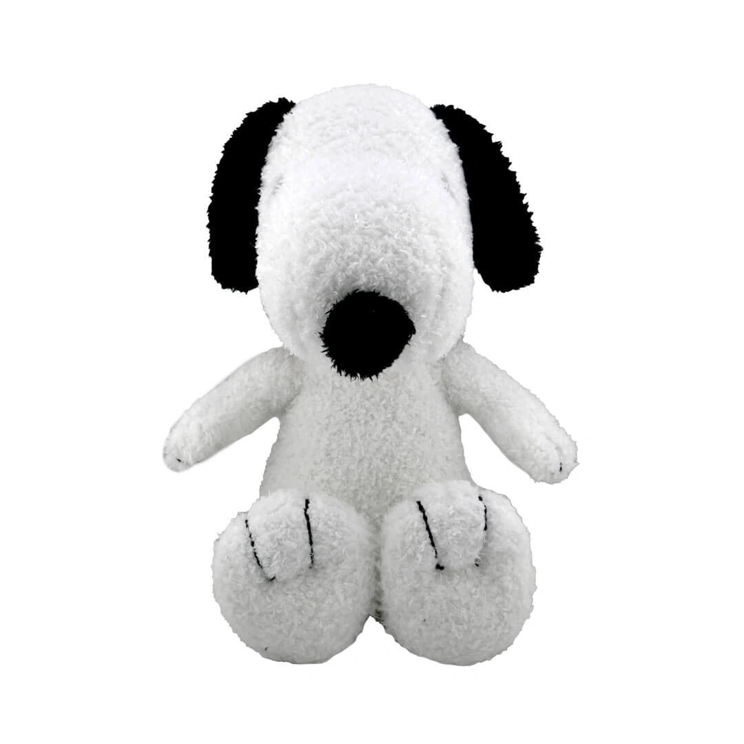 White Snoopy plush dog toy with black accents on a white background