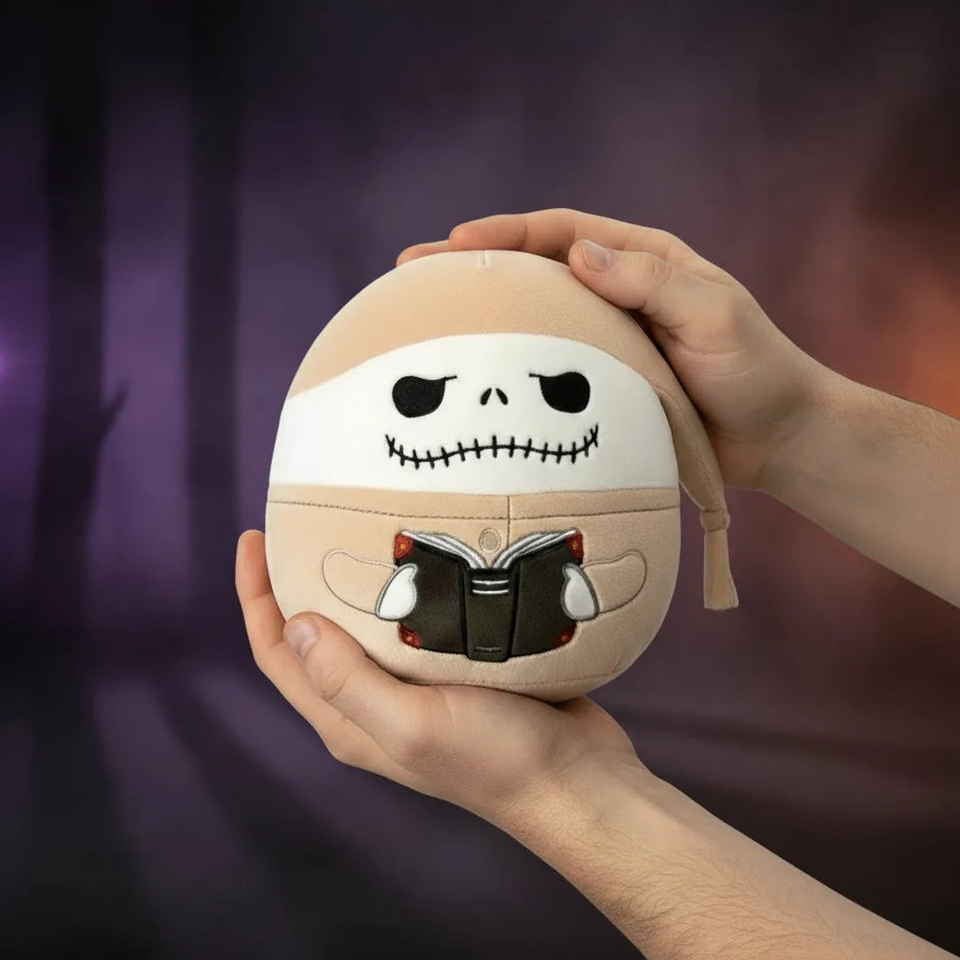 Jack Skellington Plush toy with a skull design holding a book Disney Squishmallows 