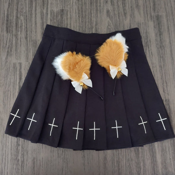 pleated skirt with crosses